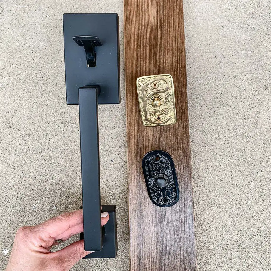 comparing stained wood, black schlage door handle and brass and black door bells