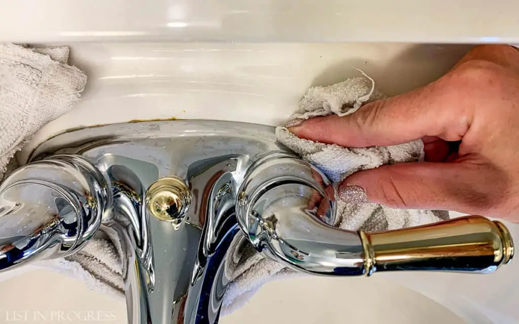 cleaning a faucet