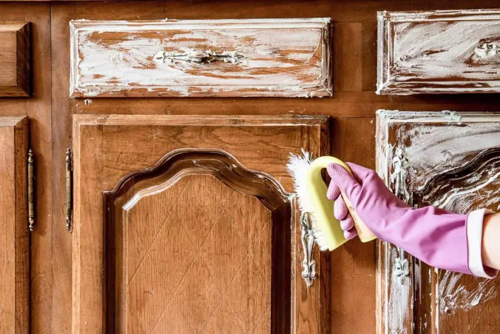 clean wood cabinets with dawn and baking soda paste then scrub