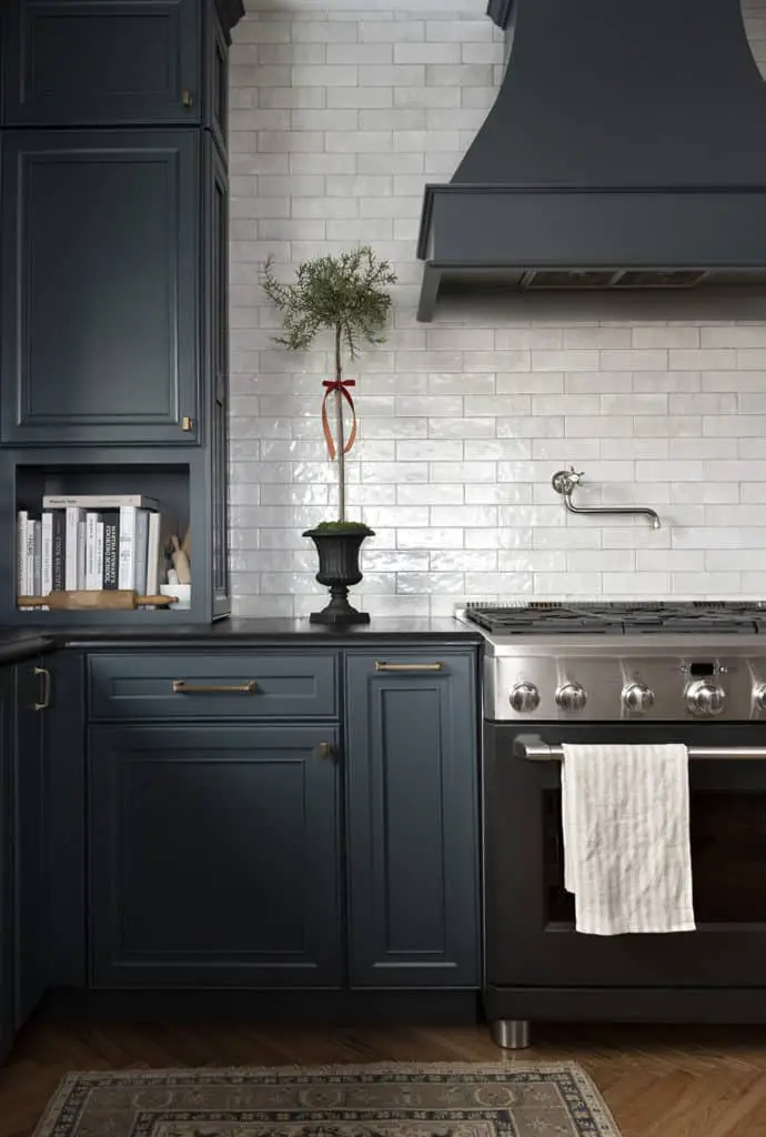 brass square pulls on dark painted cabinets