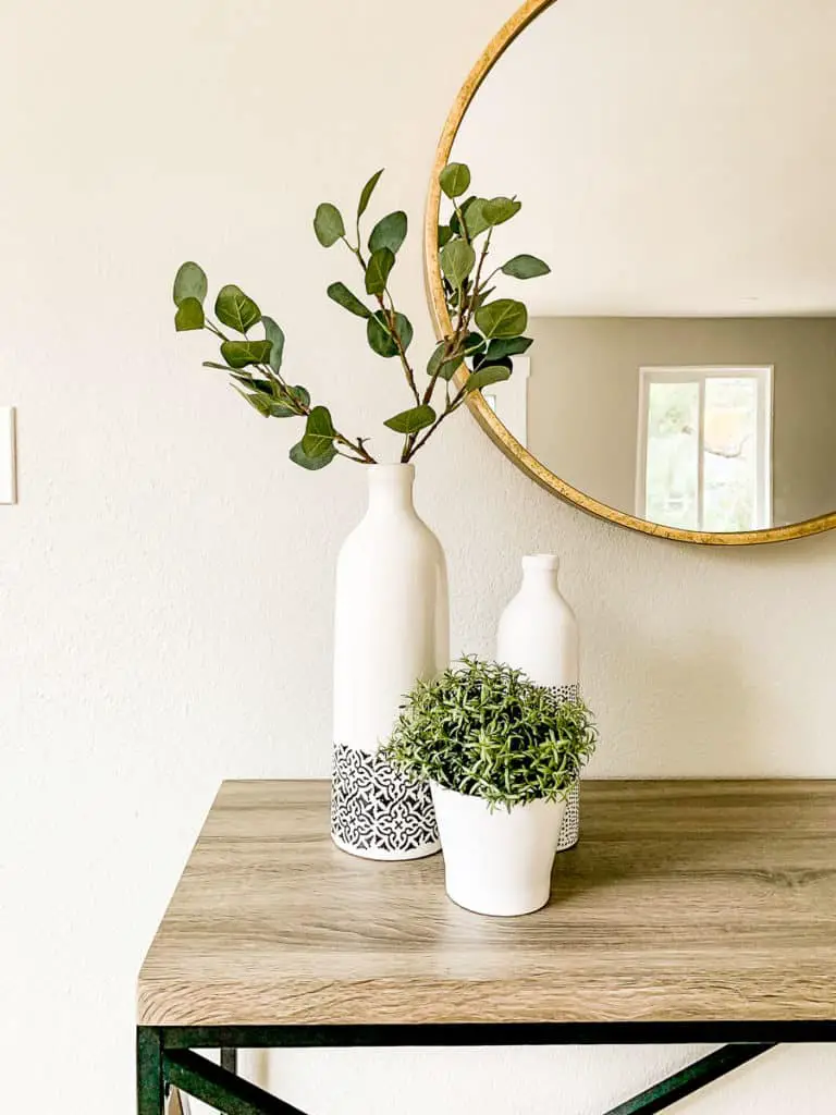 faux or live plants in every room